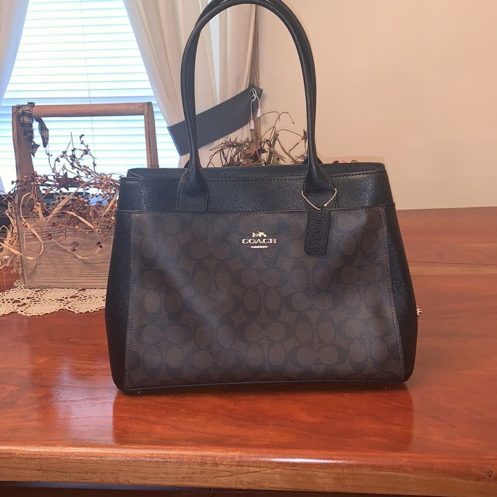 NWT authentic Coach Signature Casey Tote. Brown/Black in original box